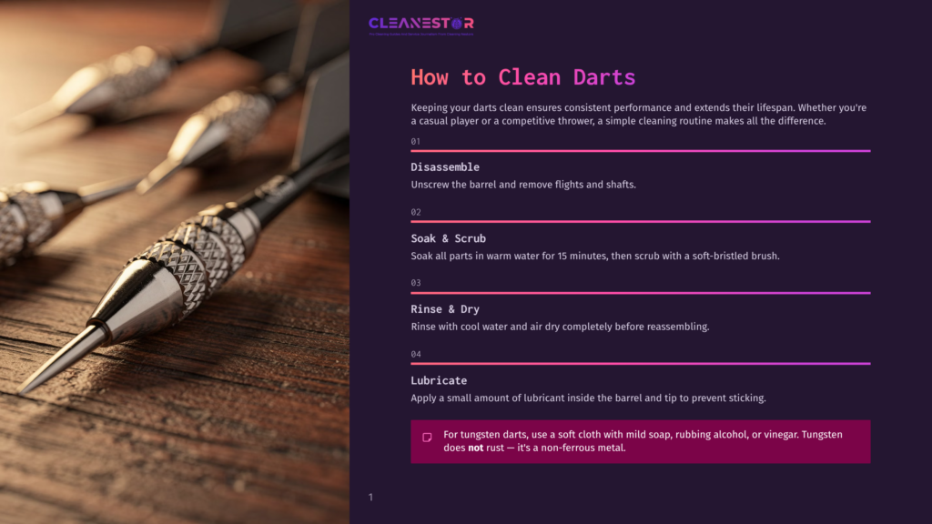 Close-Up Of Three Metal Dart Tips On A Rustic Wooden Table, With Text Overlay On The Right Detailing How To Clean Darts.