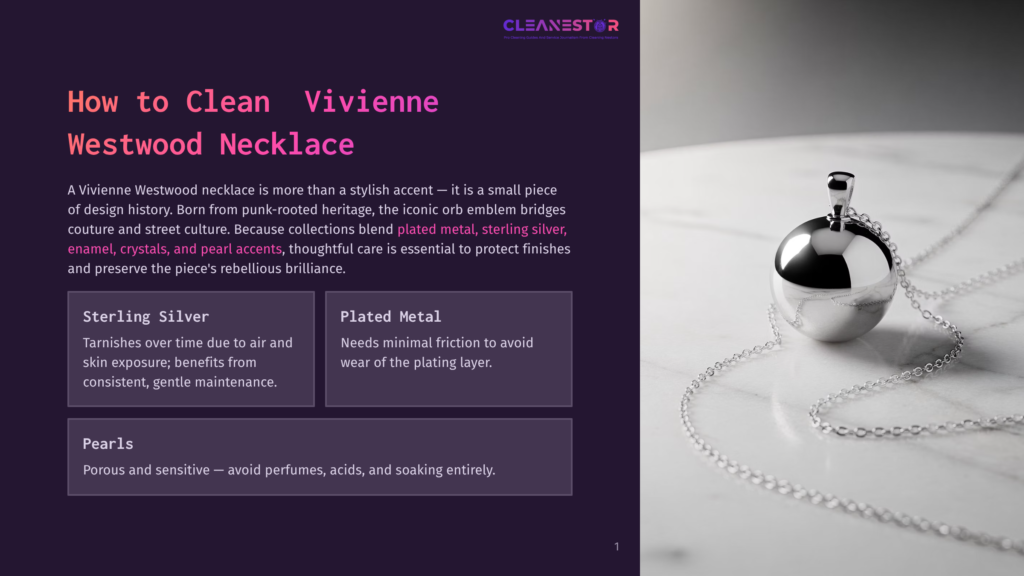 A Vivienne Westwood Orb Necklace With A Silver Chain Rests On A White Marble Surface. The Necklace Features A Silver Orb Pendant With An Iconic Vivienne Westwood Orb Emblem, Adorned With Crystals And Enamel Accents.