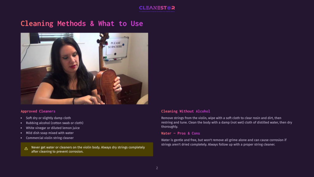 A Woman With Dark Hair, Wearing A Black Top, Demonstrates How To Clean A Violin, Holding The Instrument In Her Lap. A &Quot;Please Subscribe&Quot; Sign Is Visible On The Wall Behind Her.