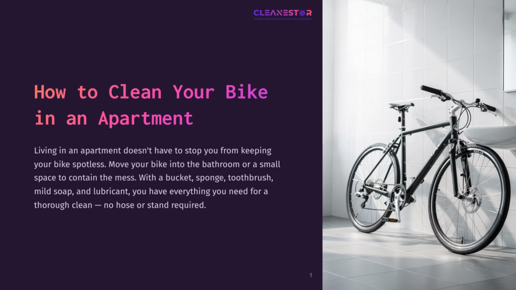 1 How To Clean Your Bike In An Apartment A Black Bicycle Is Parked In A Bright, Tiled Bathroom Next To A Sink. The Text &Quot;Cleanestor&Quot; Is Visible In The Upper Right Corner.