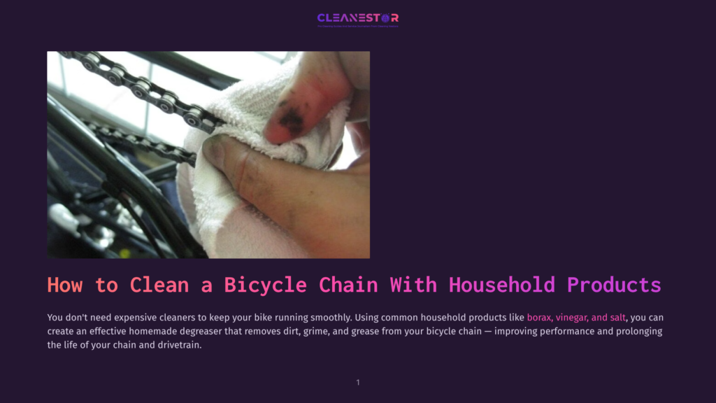 Close-Up Of A Hand Wiping A Bicycle Chain With A White Cloth, Revealing A Spot Of Dirt. The Background Shows Part Of A Bike'S Chain And Gears.