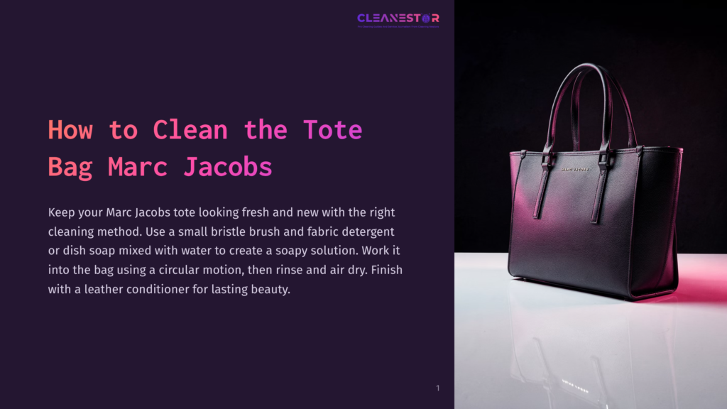 A Sleek Black Marc Jacobs Tote Bag With A Silver Metallic Handle And Logo, Resting On A White Surface With A Purple Background.
