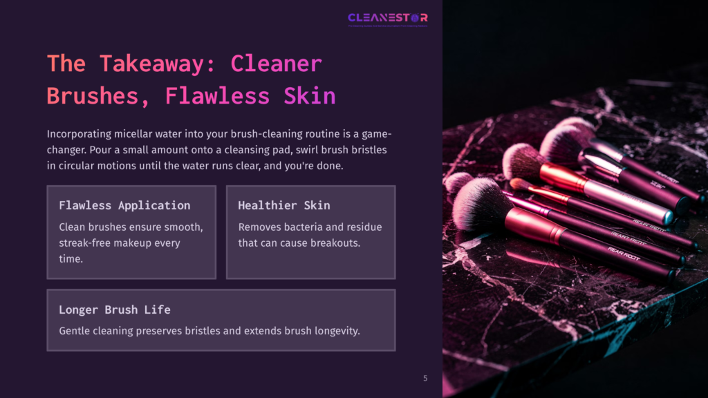 A Collection Of Makeup Brushes With Pink And Silver Handles Are Artfully Arranged On A Dark, Veined Marble Surface, Showcasing Their Soft Bristles.