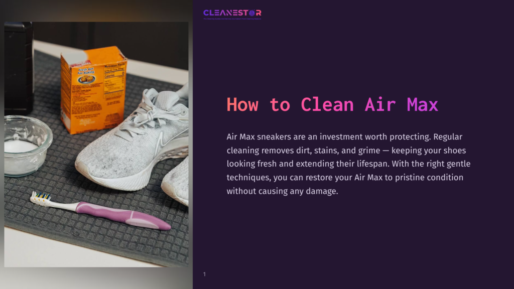 A Pair Of White Nike Air Max Sneakers Sits On A Gray Mat Next To A Box Of Baking Soda And A Toothbrush, Ready For Cleaning.