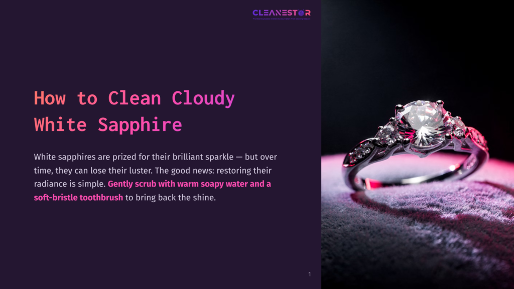 1 How To Clean Cloudy White Sapphire Close-Up Of A Sparkling White Sapphire Engagement Ring With Small Diamonds On A Textured Purple Fabric, Illuminated By Pink And White Light.