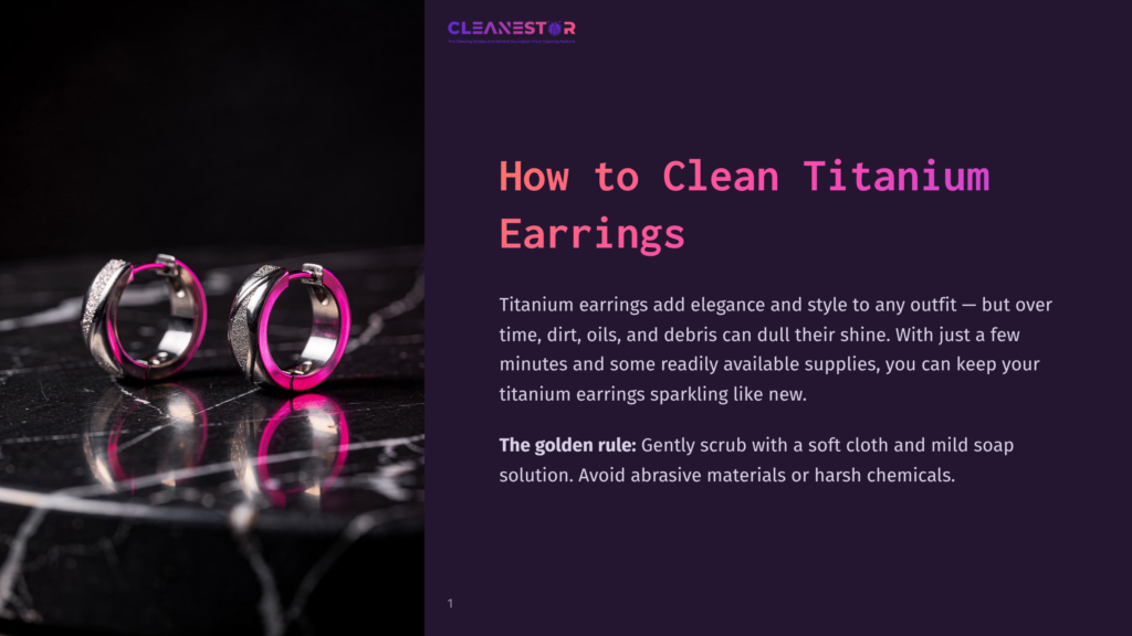1 How To Clean Titanium Earrings Close-Up Of Two Silver Titanium Hoop Earrings With Bright Pink Inner Lining, Resting On A Dark, Reflective Marble Surface.
