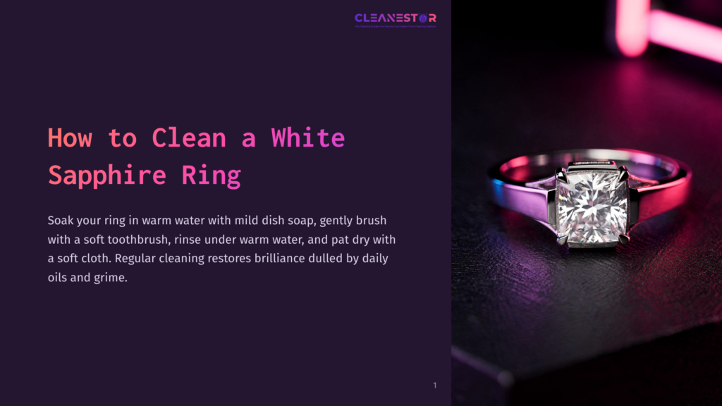 Close-Up Of A Square-Cut White Sapphire Engagement Ring With A Silver Band, Resting On A Dark, Textured Surface With Soft Pink And Blue Neon Lighting Reflecting On The Ring And Surface. &Quot;Cleanestar&Quot; Logo At The Top.