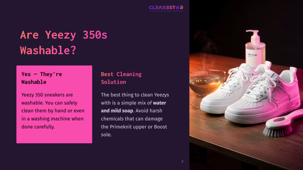 2 Are Yeezy 350S Washable Two Pairs Of White Nike Air Force 1 Sneakers, One With A Hint Of Pink, Sit On A Wooden Table Next To A Bottle Of &Quot;Mild Soap&Quot; And A Cleaning Brush. Steam Rises From A Bowl Of Water In The Background, Suggesting A Cleaning Process.