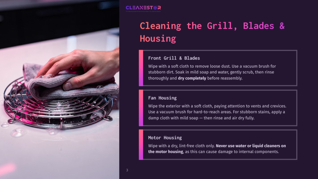 Close-Up Of A Hand Gently Wiping A Stainless Steel Grill Grate With A Grey Cloth, With A Pinkish-Purple Light Illuminating The Scene.