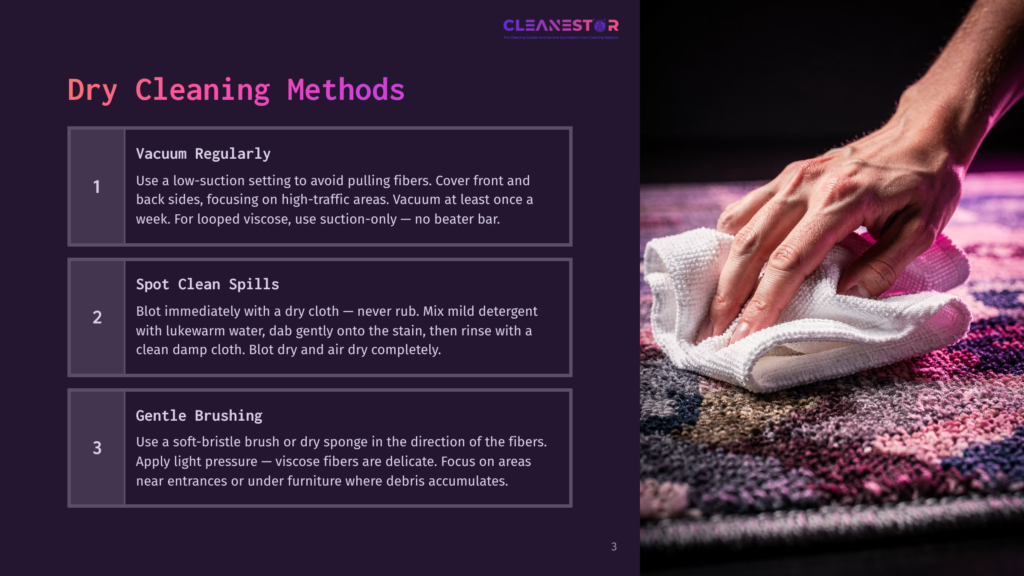 Close-Up Of A Person'S Hands Gently Wiping A Colorful, Patterned Rug With A White Microfiber Cloth, Demonstrating A Dry Cleaning Method.