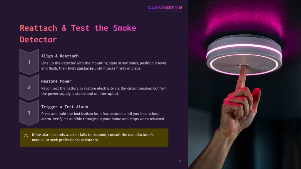 Close-Up Of A Hand Pressing The Test Button On A White And Silver Smoke Detector With Pink Led Lights, Against A Dark Background. Text Includes &Quot;Cleanestor&Quot; And &Quot;Reattach &Amp; Test The Smoke Detector&Quot;.