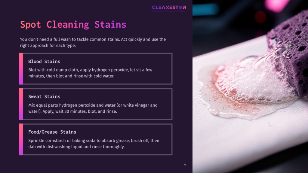 Close-Up Of A Purple Cleaning Sponge With Pink Suds And A Red Stain On White Fabric, Illustrating Spot Cleaning Methods For Blood Stains.
