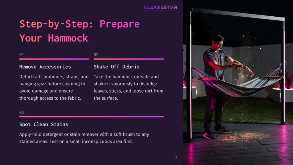 A Man In A Grey T-Shirt And Jeans Shakes A Hammock Vigorously, Sending Wood Chips And Debris Flying. He Stands On A Dark Patio At Night, With A Modern Black Hammock Stand And Subtle Pink Led Lights Visible.