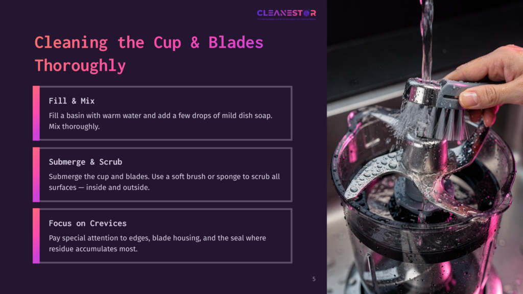 5 Cleaning The Cup And Blades Thoroughly Close-Up Of A Cleaning Brush Scrubbing The Blades Of A Food Processor Under Running Water, With Text Overlay: &Quot;Cleaning The Cup &Amp; Blades Thoroughly&Quot;, &Quot;Fill &Amp; Mix&Quot;, &Quot;Submerge &Amp; Scrub&Quot;, And &Quot;Focus On Crevices&Quot;.