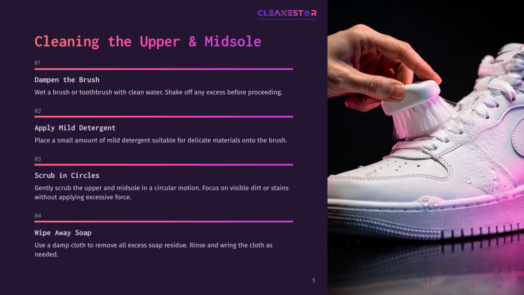 5 Cleaning The Upper And Midsole Close-Up Of A Person'S Hand Gently Scrubbing The Side Of A White Sneaker With A Soft Brush, Demonstrating The Cleaning The Upper &Amp; Midsole Process.