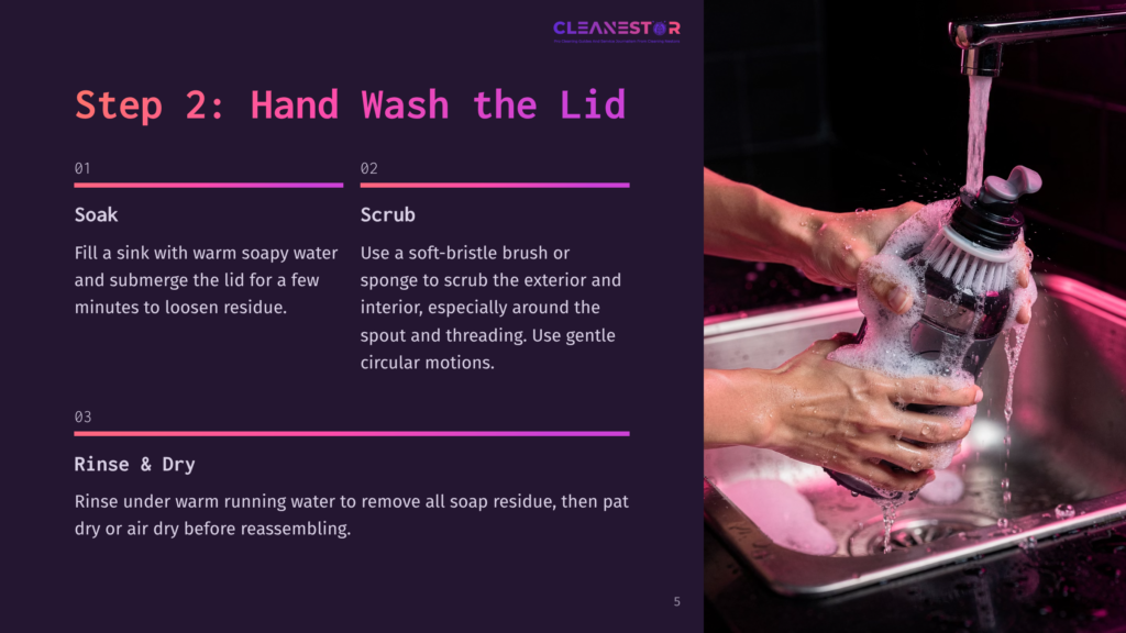 Close-Up Of Hands Washing A Black Water Bottle With A Brush Under Running Water In A Stainless Steel Sink, Creating Foamy Suds. Text Overlay With &Quot;Step 2: Hand Wash The Lid&Quot; And Cleaning Instructions.