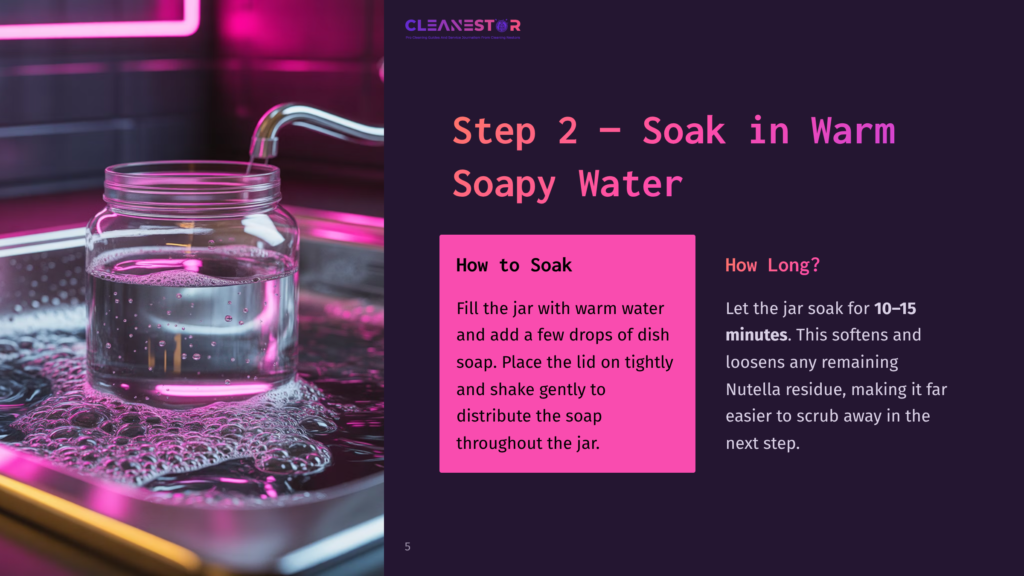 Step 2: Soak In Warm Soapy Water. A Glass Jar Filled With Warm, Soapy Water Sits In A Sink With Pink Lighting. Instructions For Soaking Are Displayed On Screen.