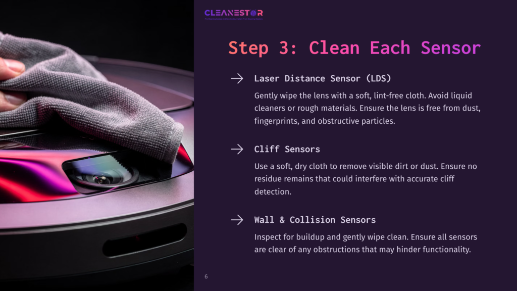 Close-Up Of A Hand Cleaning The Sensor Of A Robot Vacuum With A Grey Cloth. Text Overlay Reads: &Quot;Step 3: Clean Each Sensor&Quot;, &Quot;Laser Distance Sensor (Lds)&Quot;, &Quot;Cliff Sensors&Quot;, And &Quot;Wall &Amp; Collision Sensors&Quot;.