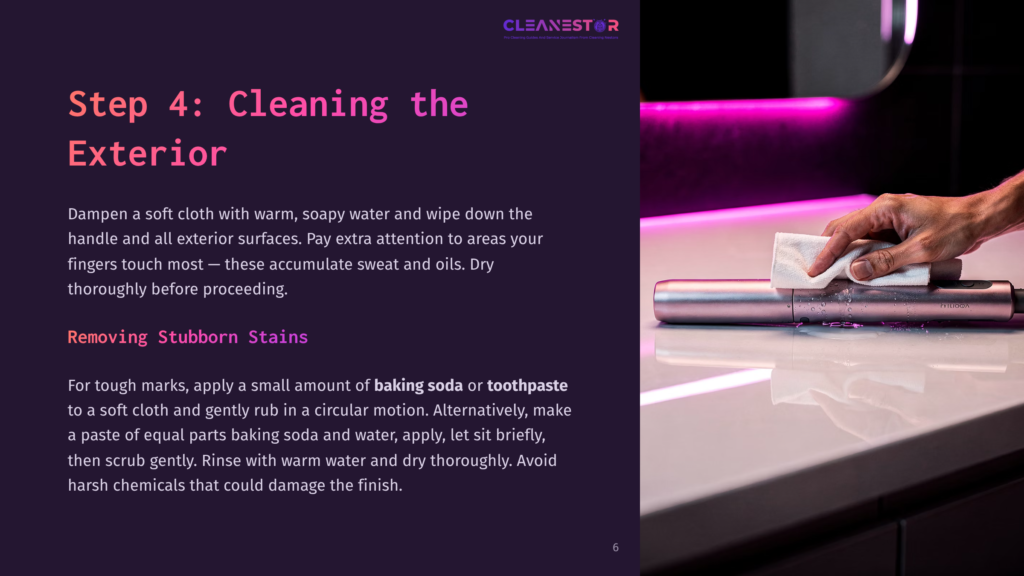 6 Step 4 Cleaning The Exterior Close-Up Of A Hand Wiping A Silver Cleaning Device With A White Cloth, With A Blurred Background Of A Modern Kitchen Counter And Pink Led Lighting.