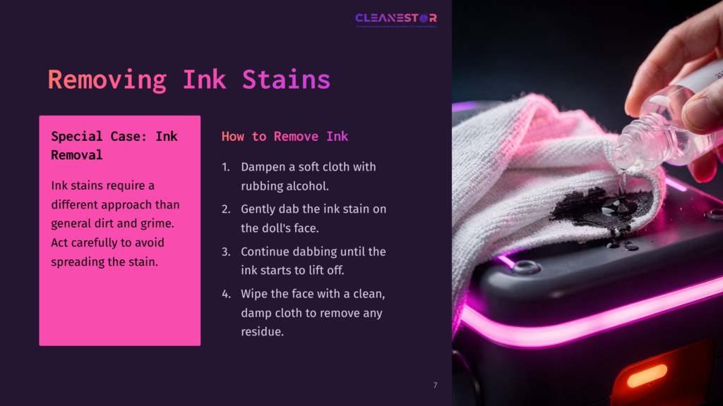 A Hand Holds A Bottle Of Rubbing Alcohol Over A Dark Surface With A Black Ink Stain And A White Cloth, Demonstrating Ink Stain Removal.
