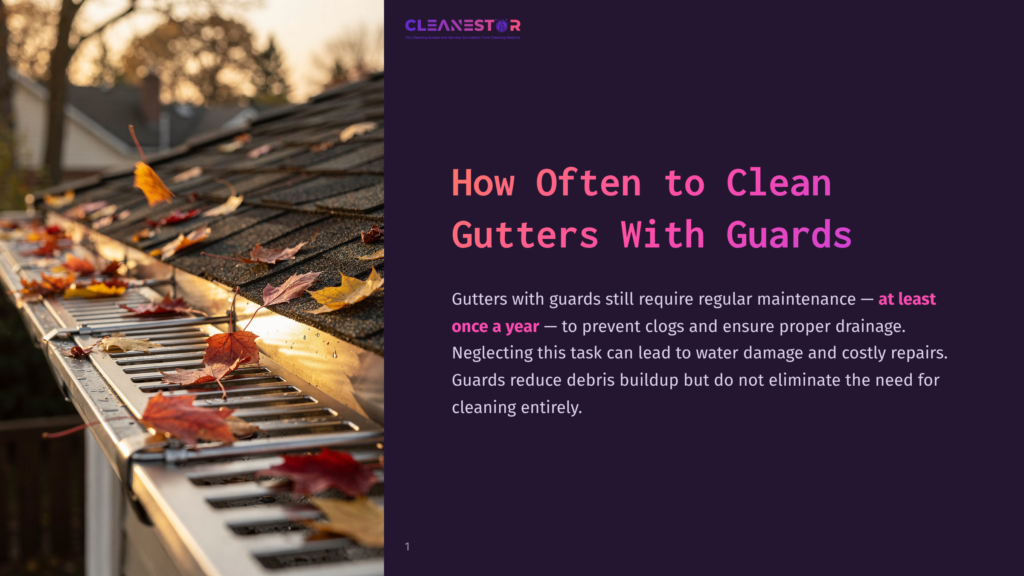 1 How Often To Clean Gutters With Guards A Close-Up Of A Rain Gutter Filled With Fallen Autumn Leaves, With A Portion Of A Shingled Roof Visible. The Leaves Are Red And Yellow, And Some Are Caught In The Gutter Guard.