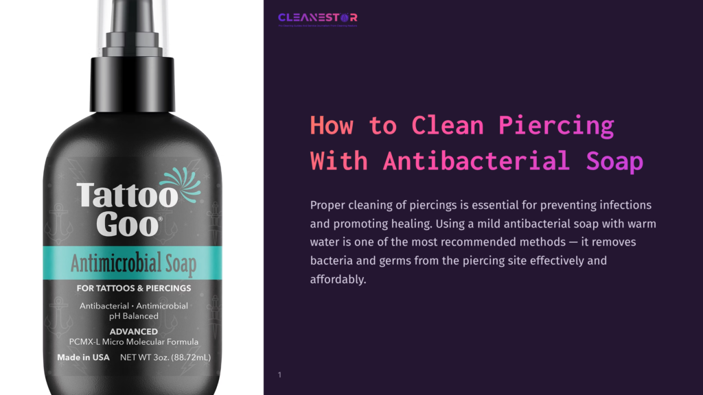 1 How To Clean Piercing With Antibacterial Soap Black Bottle Of Tattoo Goo Antibacterial Soap With A Spray Nozzle, Featuring A Teal Label And White Text, On A Purple Background.