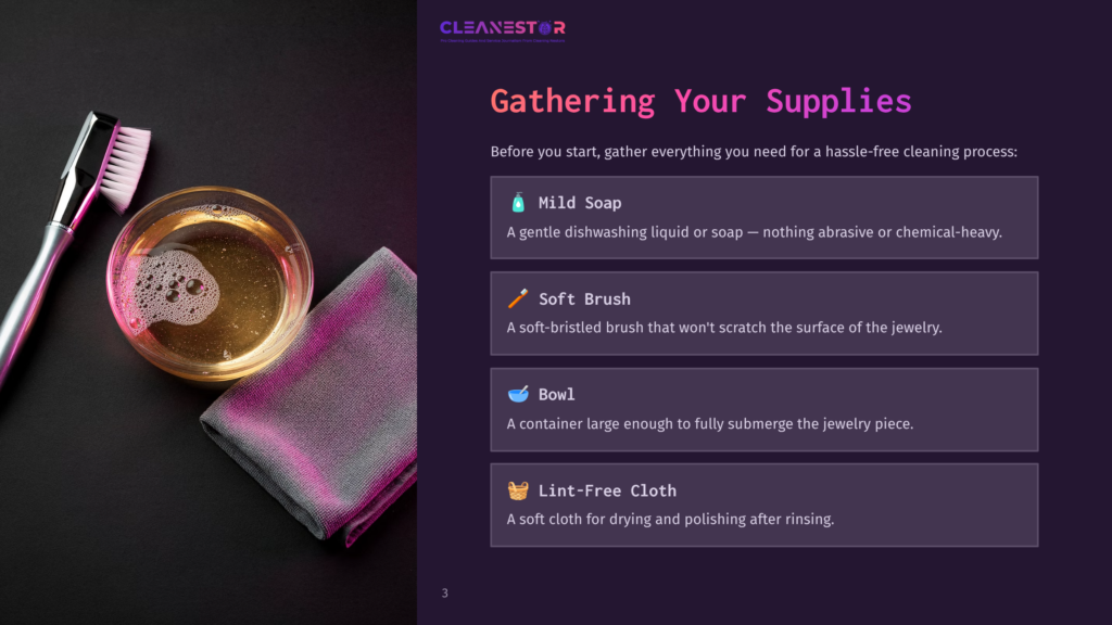 3 Gathering Your Supplies Supplies For Cleaning Jewelry: Mild Soap, A Soft Brush, A Bowl, And A Lint-Free Cloth, Displayed With A Pink Background.