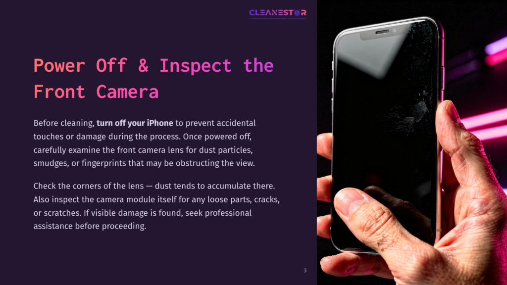A Close-Up Of A Hand Holding An Iphone With A Darkened Screen, Emphasizing The Front Camera Area For Cleaning Instructions.