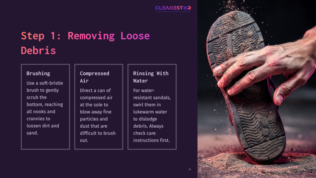 4 Step 1 Removing Loose Debris Close-Up Of A Hand Brushing Dirt And Debris Off A Sandal Sole, Part Of A &Quot;How To Remove Loose Debris&Quot; Cleaning Guide With Text.