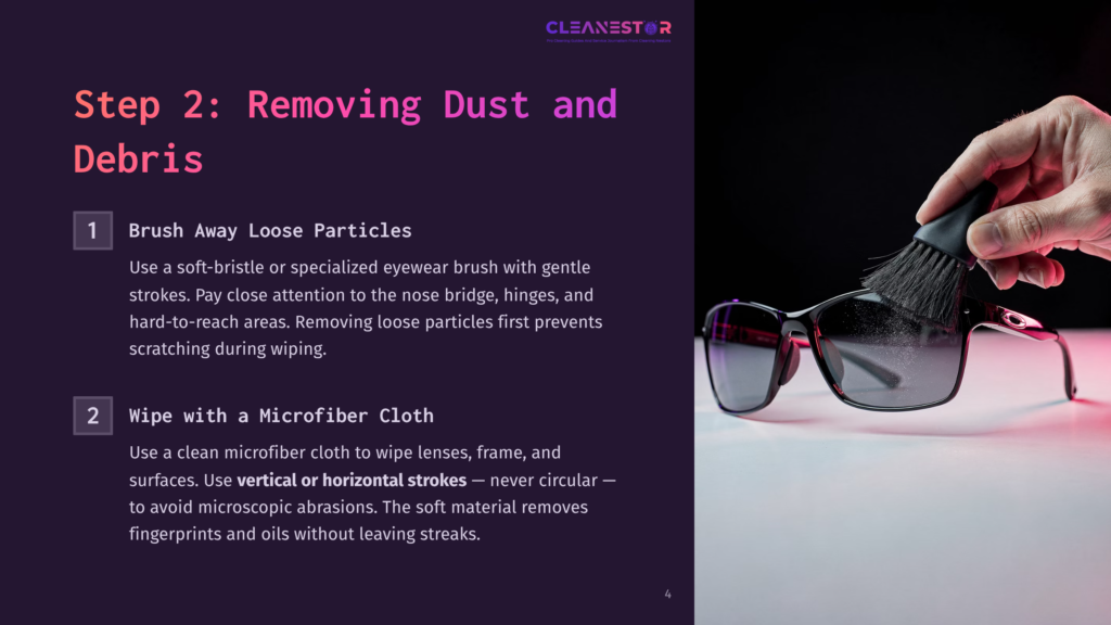 Step 2: Removing Dust And Debris From Sunglasses With A Brush And Microfiber Cloth. Includes Text: &Quot;Brush Away Loose Particles&Quot; And &Quot;Wipe With A Microfiber Cloth.
