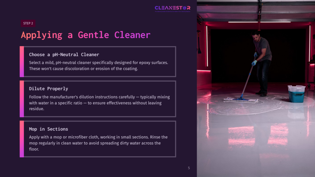 A Person Mops A Glossy Epoxy Floor In A Garage, Surrounded By Contrasting Purple And Pink Lighting, Demonstrating A Cleaning Step.