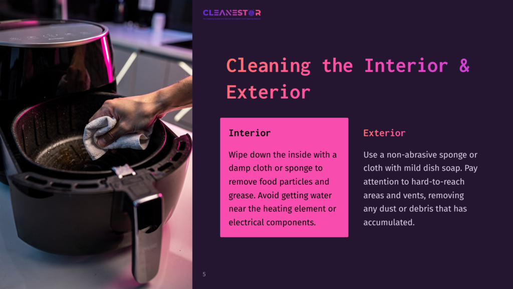 Close-Up Of A Hand Wiping The Inside Of A Black Air Fryer Basket With A Damp Cloth, With Text Overlay &Quot;Cleanestor Cleaning The Interior &Amp; Exterior&Quot;.