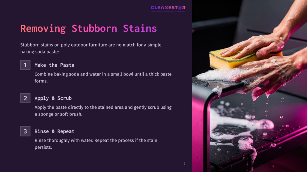 Close-Up Of Hands Scrubbing A Dark Outdoor Furniture Stain With A Baking Soda Paste And A Yellow Sponge, With Suds And Water Splashing.