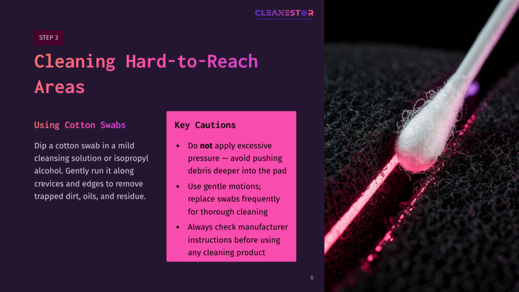 Close-Up Of A Cotton Swab With Pink Liquid Being Used To Clean A Textured Black Surface, With Text Overlaying The Left Side Of The Image Detailing Cleaning Instructions For Hard-To-Reach Areas.