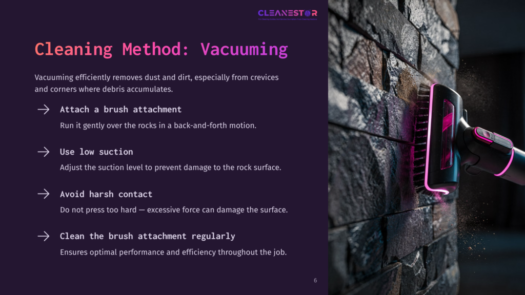 A Vacuum Cleaner With A Brush Attachment Is Shown Against A Textured Rock Fireplace Wall, Emphasizing Cleaning Method Instructions.