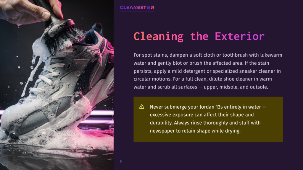Close-Up Of A Hand Cleaning A White And Grey Sneaker With A Brush And Soap Suds. Text Overlay Reads &Quot;Cleanestor&Quot; And &Quot;Cleaning The Exterior&Quot;.