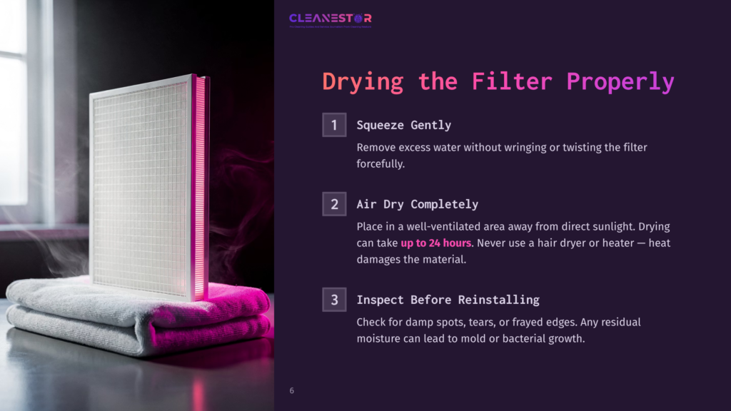 A Clean Air Filter Rests On Top Of Neatly Folded Gray Towels, With Pink Light Illuminating Its Edges. The Image Is Part Of A &Quot;Cleanestor&Quot; Guide On How To Dry A Filter Properly, Featuring Text About Squeezing, Air Drying, And Inspection.