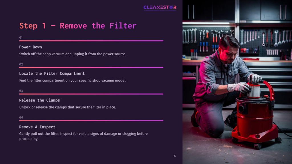 6 Step 1 Remove The Filter A Man In A Gray Uniform And Red Gloves Carefully Removes A Red Vacuum Cleaner Filter In A Workshop. The Text &Quot;Cleanestor&Quot; And &Quot;Step 1 - Remove The Filter&Quot; Are Visible.