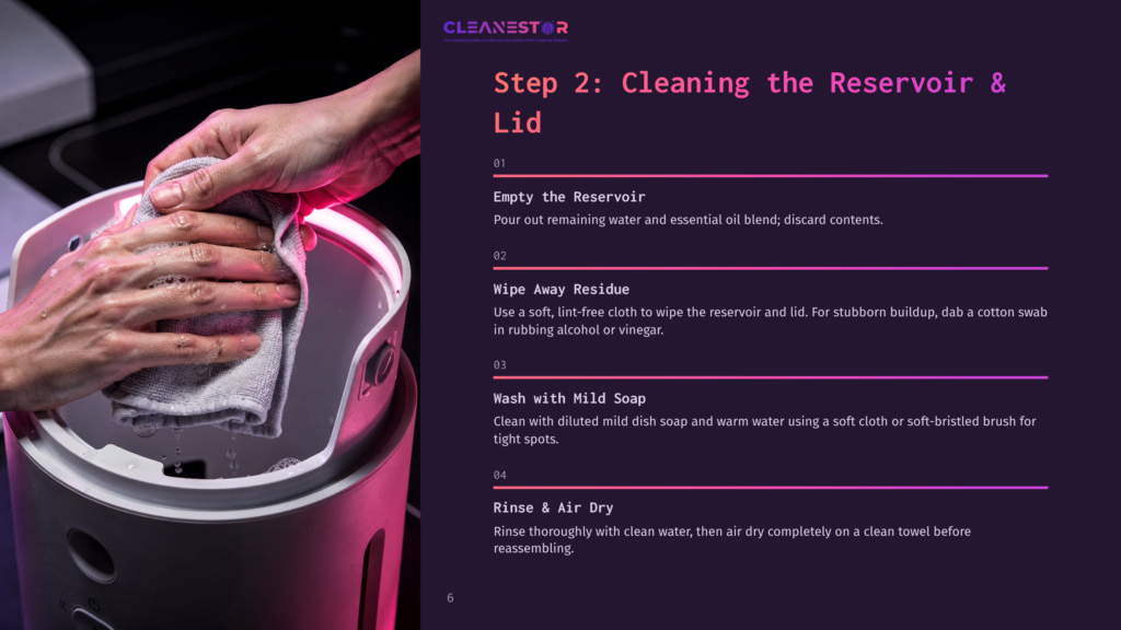 Hand Wiping The Interior Of A Pink And Silver Aroma Diffuser, With Instructions For Cleaning, On A Purple Background.