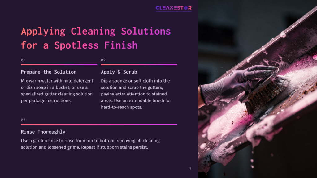 7 Applying Cleaning Solutions For A Spotless Finish Close-Up Of Gloved Hands Scrubbing A Dirty Gutter With A Brush And Pink Cleaning Solution, Showing The Cleaning Process For A Spotless Finish.