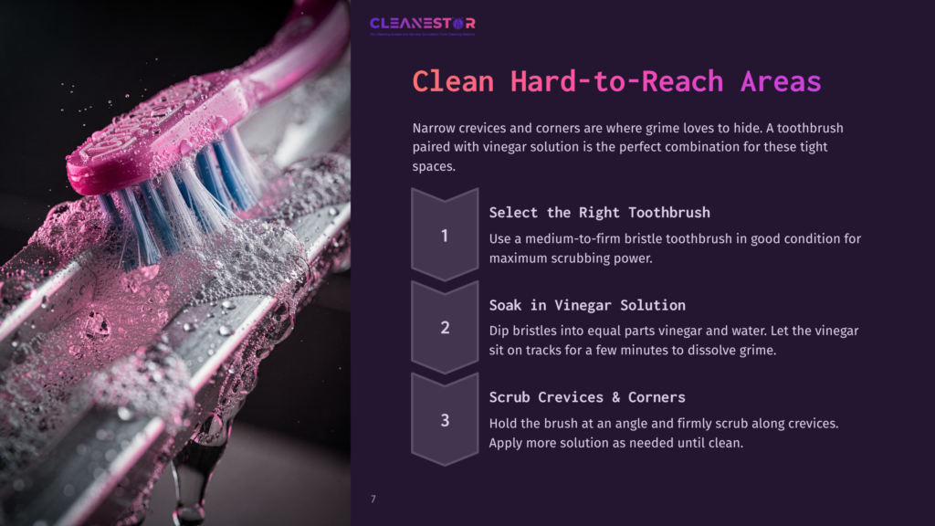Close-Up Of A Pink Toothbrush With Blue Bristles Scrubbing A Metal Surface Covered In Soap Suds And Water Droplets, With Text Overlay &Quot;Cleanestor Clean Hard-To-Reach Areas&Quot;.