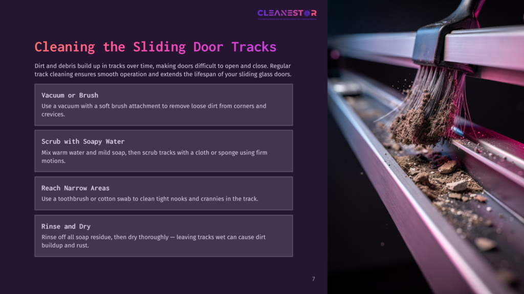 A Close-Up Of Sliding Door Tracks With Dirt And Debris Being Cleaned. A Vacuum Attachment Is Shown Removing Dust And Grime.