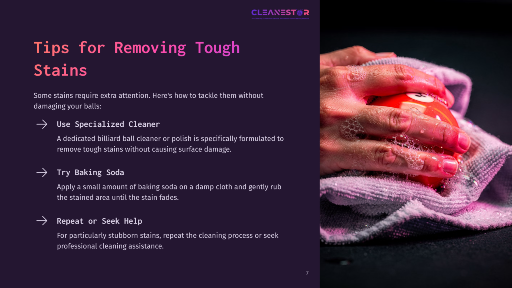 A Hand Scrubs A Red Billiard Ball With A Damp Cloth, Showcasing Tips For Removing Tough Stains On A Dark Purple Background.