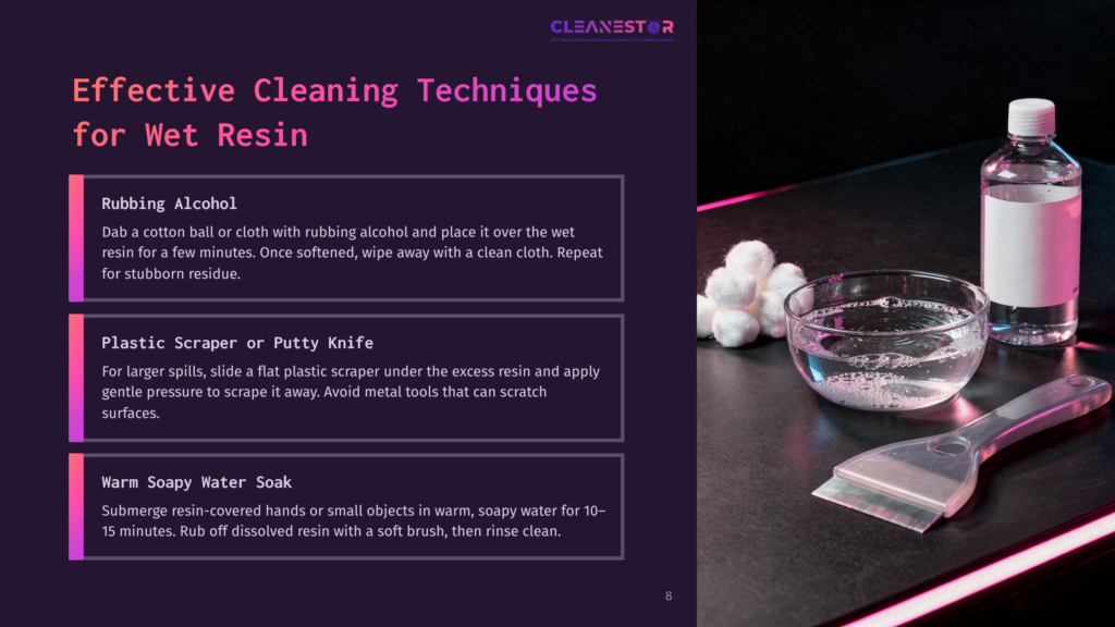 8 Effective Cleaning Techniques For Wet Resin A Still Life Setup For Cleaning Wet Resin, Featuring A Clear Bowl Of Water With Cotton Balls, A Flat Plastic Scraper, And A Bottle Of Rubbing Alcohol On A Dark Surface With Pink Lighting.