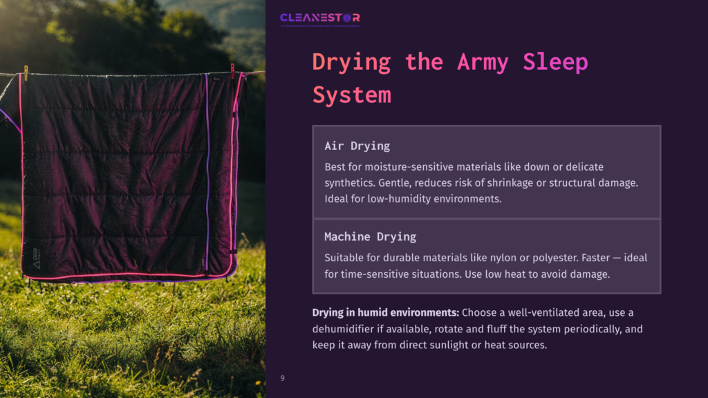 A Black Sleeping Bag Hangs On A Clothesline, With Lush Green Grass And Trees In The Background, Showcasing Air Drying Techniques.