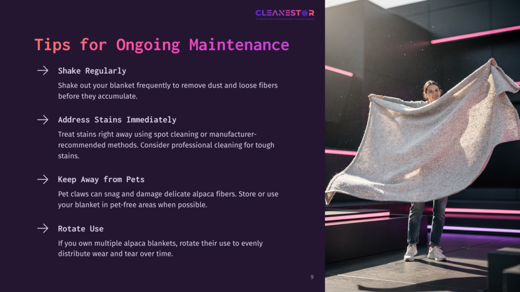 A Person Holding A Light Gray Alpaca Blanket, With A Pink And Black Background Showing An Indoor Setting, Emphasizing Fabric Care Tips.