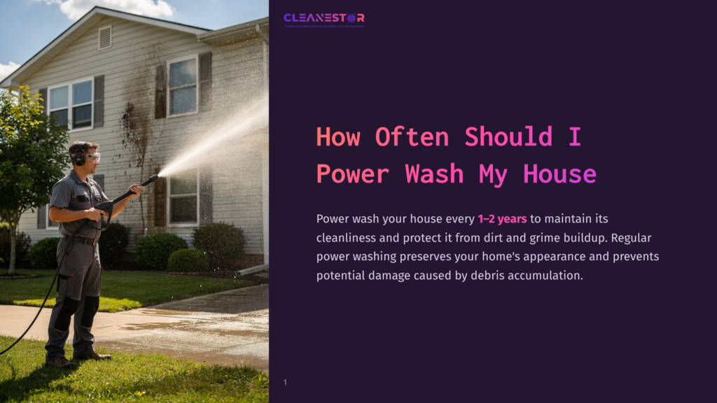 1 How Often Should I Power Wash My House A Man In Work Clothes And Safety Glasses Power Washes A Dirty House Exterior With A High-Pressure Water Spray, Cleaning Siding And Windows. The Text On The Right Reads &Quot;Cleanestor&Quot; And &Quot;How Often Should I Power Wash My House&Quot;.