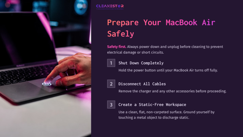 A Person’s Hand Pressing The Power Button On A Macbook Air, With A Charger Unplugged And A Dark, Clean Workspace In The Background.