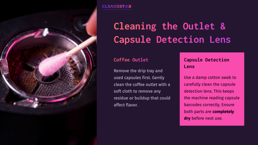 Close-Up Of A Nespresso Machine'S Coffee Outlet, With A Cotton Swab Cleaning The Capsule Detection Lens, Set Against A Dark Background.