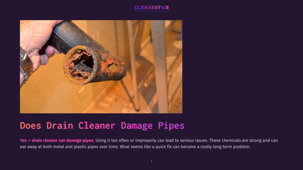 Close-Up Of A Severely Corroded And Clogged Drain Pipe, Showing Rust And Debris, Held By A Hand Wearing A Watch.
